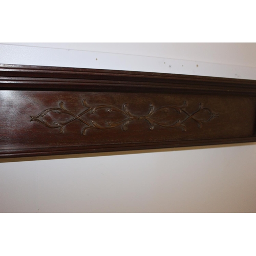 532 - Carved mahogany door head { 20cm H X 122cm W X 15cm D }.