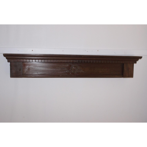 533 - Carved mahogany door head { 20cm H X 122cm W X 15cm D }.