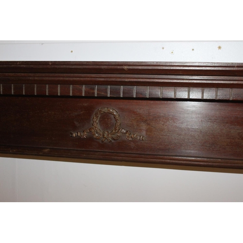 533 - Carved mahogany door head { 20cm H X 122cm W X 15cm D }.