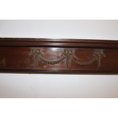 534 - Carved mahogany door head { 20cm H X 122cm W X 15cm D }.