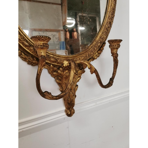 540 - 19th C. giltwood and gesso wall mirror with two sconces {108 cm H x 56 cm W}.