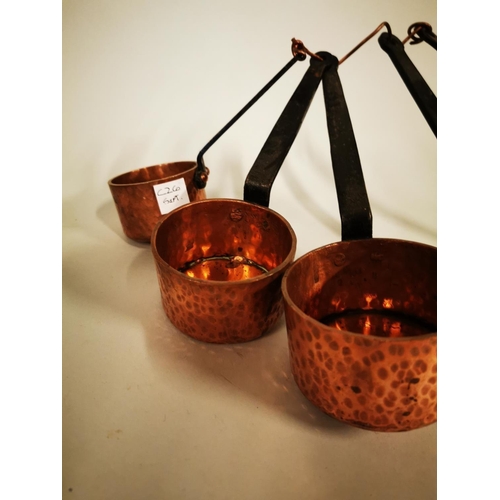 543 - Set of five graduated hand beaten copper sauce saucepans {LARGEST - 7 cm H x 26 cm W x 12 cm D and S... 