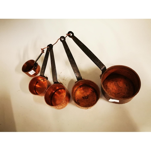 543 - Set of five graduated hand beaten copper sauce saucepans {LARGEST - 7 cm H x 26 cm W x 12 cm D and S... 