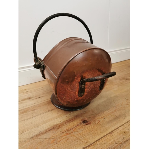 55 - Good quality 19th C. copper coal scuttle with wrought iron handle {44 cm H x 35 cm W x 57 cm D}.