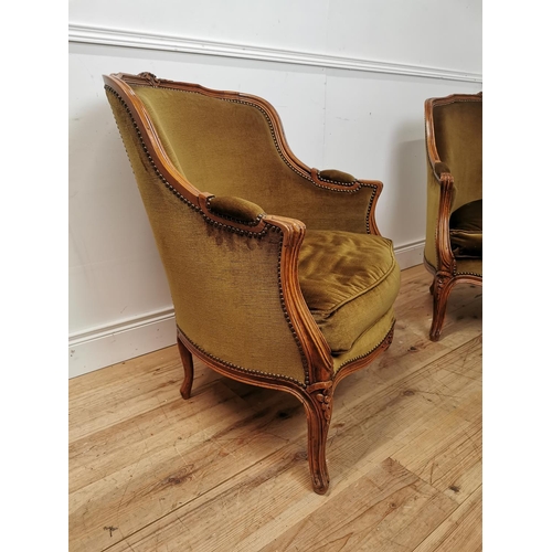 553 - Pair of early 20th. C. French velvet upholstered armchairs { 89cm H X 74cm W X 70cm D }.