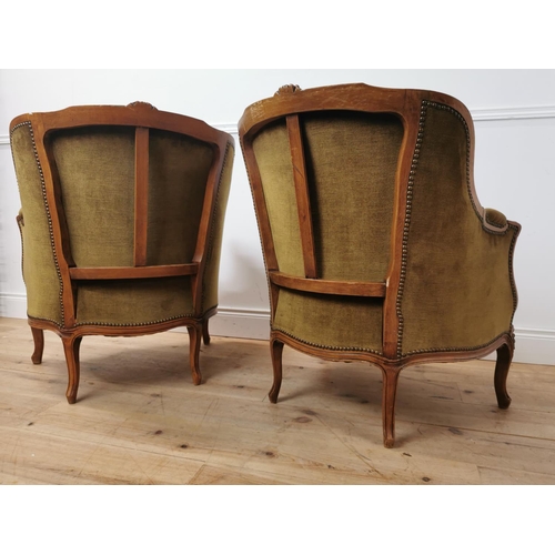 553 - Pair of early 20th. C. French velvet upholstered armchairs { 89cm H X 74cm W X 70cm D }.