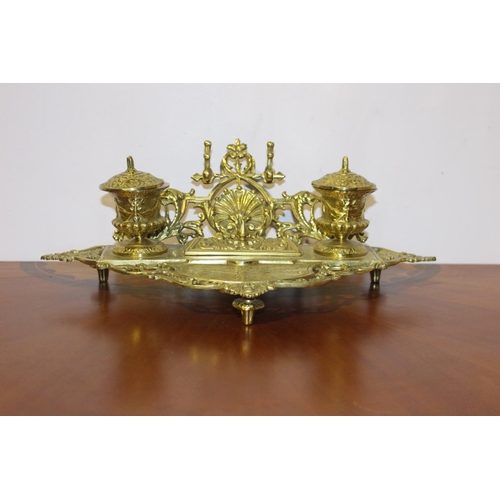 557 - Decorative brass inkwell with ceramic pots { 14cm H X 40cm W X 22cm D }.