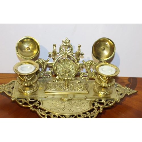 557 - Decorative brass inkwell with ceramic pots { 14cm H X 40cm W X 22cm D }.