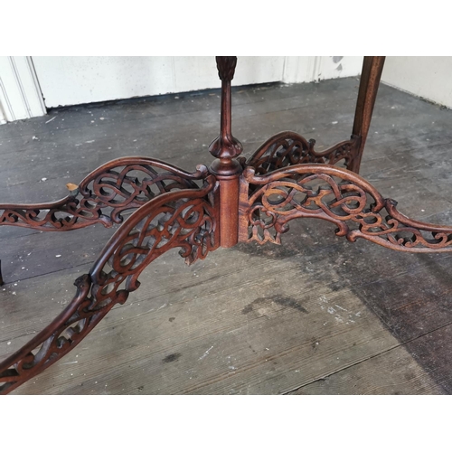 561 - Georgian mahogany tea table in the Chippendale style with pierced gallery raised on four tapered leg... 