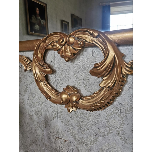 562 - Pair of good quality gilt wall mirrors, surmounted with foliage, in the Rococo style. { 174cm H X 10... 