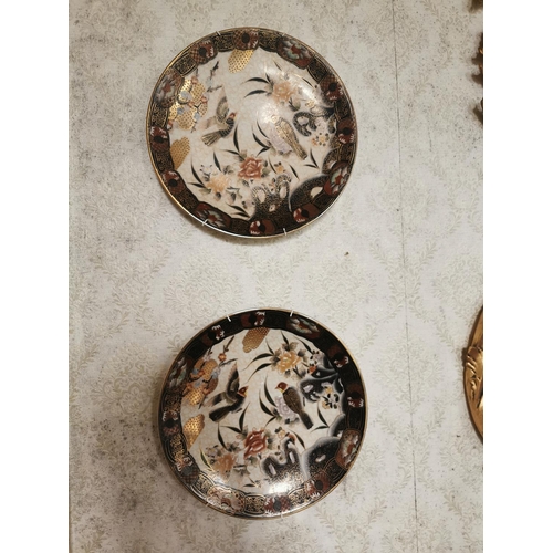 563 - Pair of decorative Oriental ceramic wall plates { 31cm Dia }.