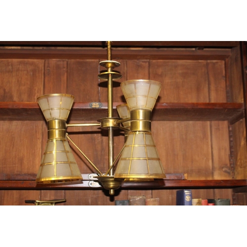 578 - Brass and glass three branch chandelier { 50cm H X 40cm Dia }.