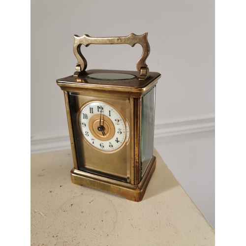 581 - 19th C. brass carriage clock. { 14 cm H x 8 cm W x 6 cm D}.