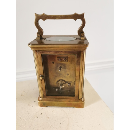 581 - 19th C. brass carriage clock. { 14 cm H x 8 cm W x 6 cm D}.