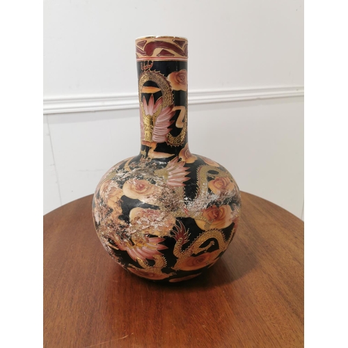 589 - Oriental ceramic onion vase decorated with flowers and dragons { 33cm H X 20cm Dia }.