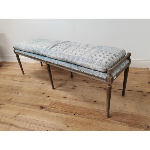 608 - Bleached oak window seat with upholstered seat and cushion raised on tapered reeded legs { 55cm H X ... 