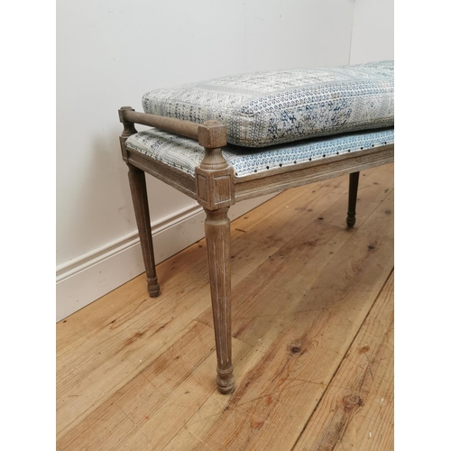 608 - Bleached oak window seat with upholstered seat and cushion raised on tapered reeded legs { 55cm H X ... 