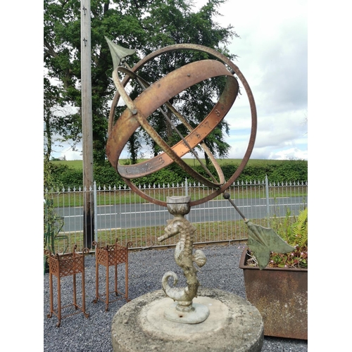 636 - Armorial sundial mounted on composition pedestal {185 cm H x 42 cm Dia.}.