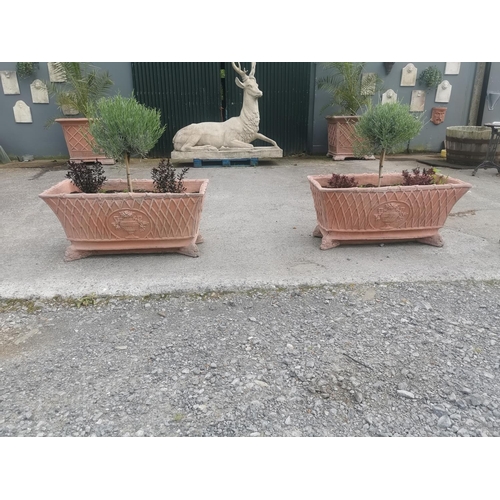 644 - Pair of good quality moulded terracotta rectangular planters with basket weave decoration mounted on... 