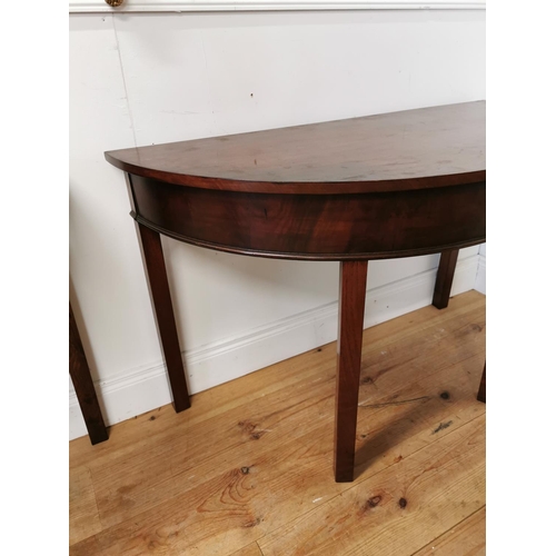 65 - Pair of Georgian mahogany demi-lune side tables raised on square legs {73 cm H x 114 cm W x 54 cm D}... 