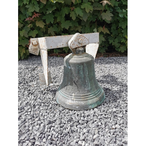 653 - 19th C. bronze bell with original metal brackets. {44 cm H x 30 cm W x 45 cm D}.