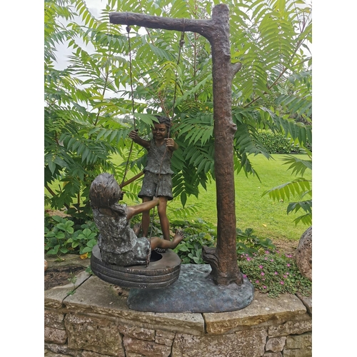 662 - Exceptional quality bronze sculpture of Two Girls on a Swing {145 cm H x 87 cm W x 70 cm D}.