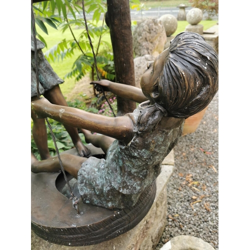 662 - Exceptional quality bronze sculpture of Two Girls on a Swing {145 cm H x 87 cm W x 70 cm D}.