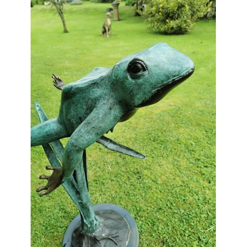 663 - Bronze model of leaping frog on marble base {82 cm H x 40 cm W x 78 cm D}.