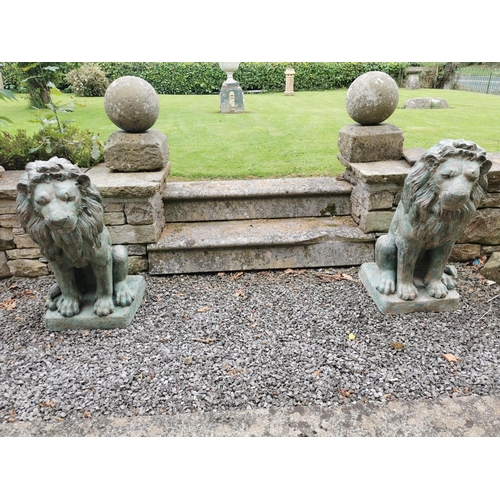 667 - Pair of exceptional quality bronze seated Lions {80 cm H x 42 cm W x 40 cm D}.