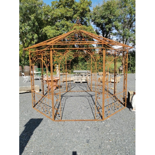 670 - Good quality decorative wrought iron garden gazebo {330 cm H x 335 cm Dia.}.