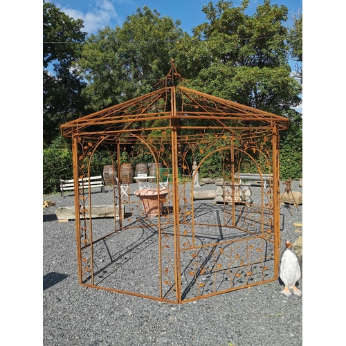 670 - Good quality decorative wrought iron garden gazebo {330 cm H x 335 cm Dia.}.