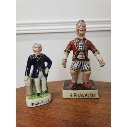 674 - Two ceramic figures  - Gladstone & Grimaldi { 18cm H X & 13cm H }.