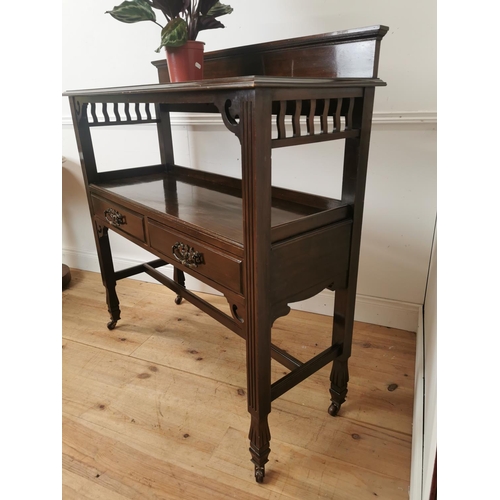 675 - Art Nouveau mahogany server the gallery back over a open shelf with two frieze drawers raised on squ... 