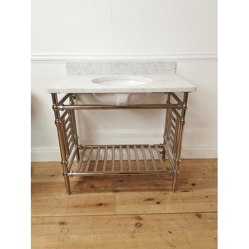 679 - Marble top and basin mounted on chrome radiator stand { 96cm H X 91cm W X 51cm D }.