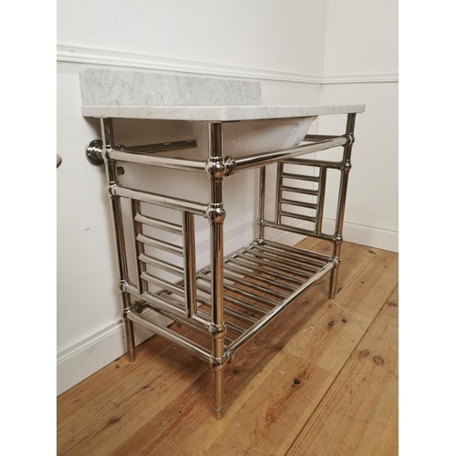 679 - Marble top and basin mounted on chrome radiator stand { 96cm H X 91cm W X 51cm D }.