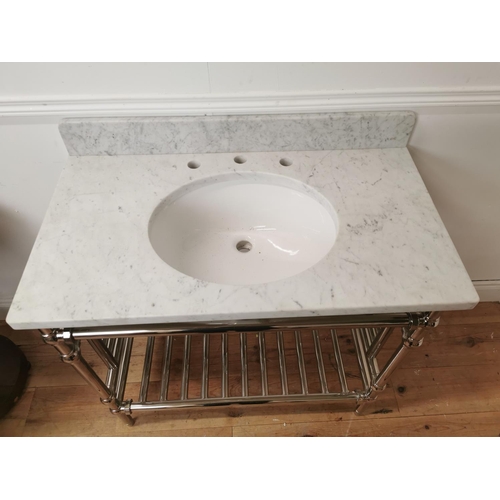 679 - Marble top and basin mounted on chrome radiator stand { 96cm H X 91cm W X 51cm D }.