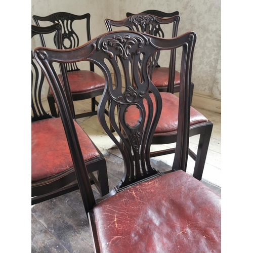 684 - Set of six Edwardian mahogany dining chairs with inset leather seats raised on square legs in the Ge... 