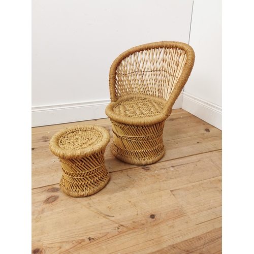 691 - Child's rattan and wicker chair and stool. { 55cm H X 36cm W X 30cm D & 22cm H X 24cm Dia }.