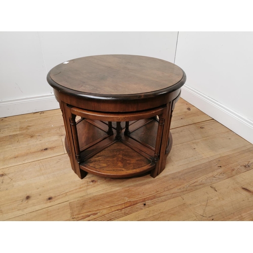 692 - 1950's nest of five walnut tables { 54cm H X 70cm Dia }.