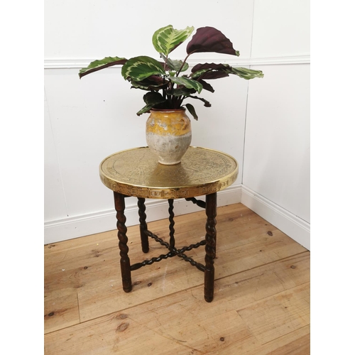 696 - Indian folding table with beaten brass top. { 59cm H X 59cm Dia }