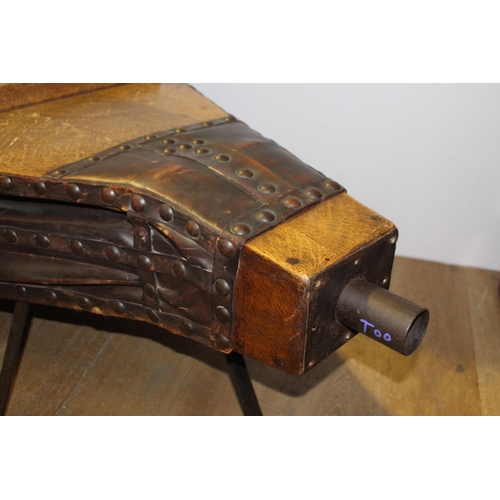 710 - Coffee table in the form of a 19th. C. blacksmith's bellows { 50cm H X 145cm W X 86cm D }.