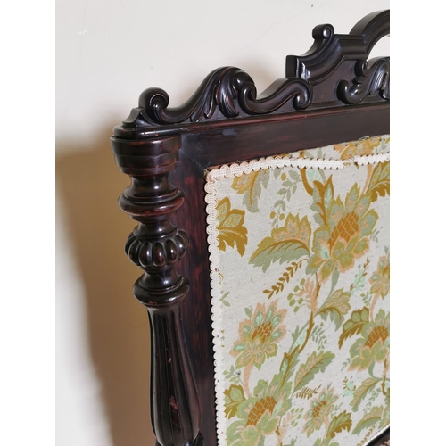 724 - 19th. C. mahogany fire screen the cloth panel flanked by turned columns raised on out swept supports... 