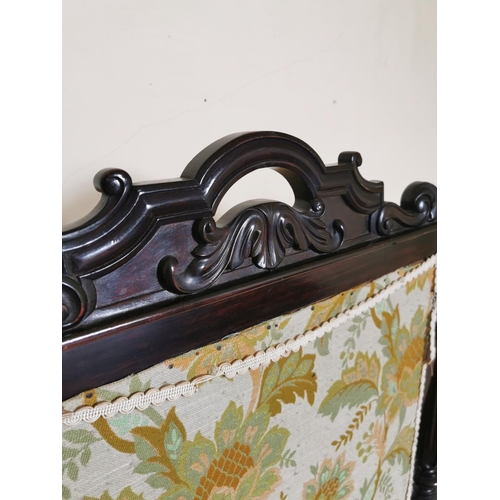 724 - 19th. C. mahogany fire screen the cloth panel flanked by turned columns raised on out swept supports... 