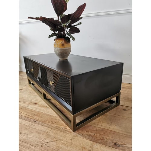 733 - Orlando Black Gloss painted finish coffee table with geometric panels the two short drawers in the f... 