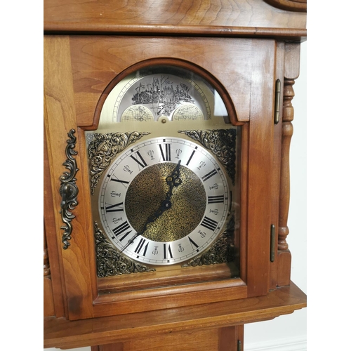 744 - Walnut grandmother clock with brass arched dial and glazed long door { 185cm H X 40cm W  X 25cm D }.