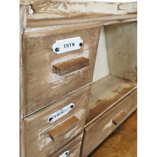 748 - Early 20th C. painted pine herb drawers in the shape of a triangle  {43 cm H x 67 cm W x 16 cm D}.