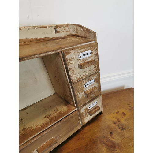 748 - Early 20th C. painted pine herb drawers in the shape of a triangle  {43 cm H x 67 cm W x 16 cm D}.