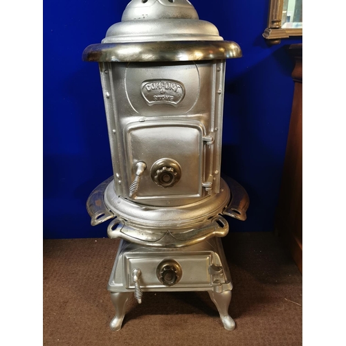 783 - Early 20th. C. cast iron Comfort stove. {190 cm H  x 60 Diam}.