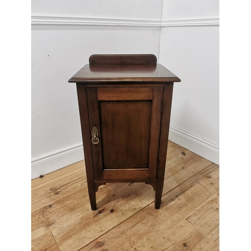 803 - Edwardian mahogany bedside locker the gallery back above a single paneled door raised on tapered squ... 