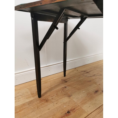 806 - Folding oak card table with green baize panel raised on tapered legs { 70cm H X 69cm Sq }.